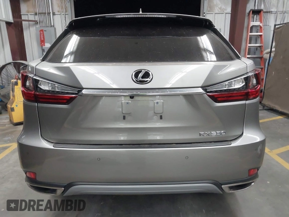 2022 Lexus RX 350 z VIN 2T2HZMDA9NC366292, wystawiony jako IAAI lot #42381449 z przebiegiem 26 717 mil mil oraz . Historia ofert i sprzedaży dostępna na DreamBid. Obrazek 16.