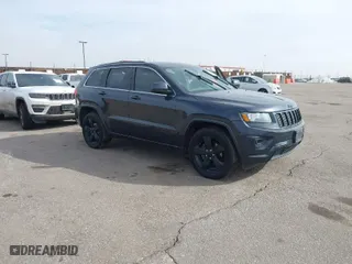 2015 Jeep Grand Cherokee Altitude with VIN 1C4RJFAG3FC608198, listed as a IAAI auction lot 41512629 with 154,647 mi miles. Bid and sale history available at carsss.com. Image 1.
