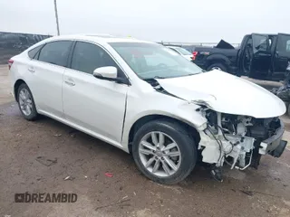 2013 Toyota Avalon XLE with VIN 4T1BK1EB8DU076613, listed as a IAAI auction lot 41709842 with 60,889 mi miles and . Bid and sale history available at DreamBid. Image 1.