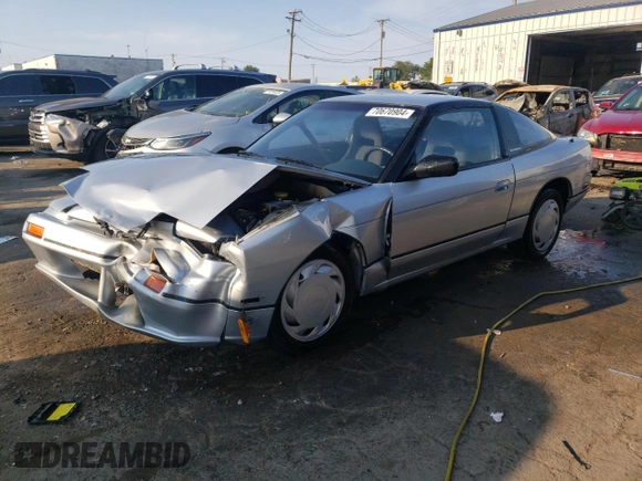 1990 Nissan 240SX z VIN JN1HS36P0LW121487, wystawiony jako Copart lot #70670904 z przebiegiem 123 794 mil mil oraz Szkody całkowita. Historia ofert i sprzedaży dostępna na DreamBid. Obrazek 1.