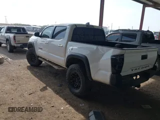 2021 Toyota Tacoma SR z VIN 3TMCZ5AN4MM373247, wystawiony jako IAAI lot #41982617 z przebiegiem 45 692 mil mil oraz . Historia ofert i sprzedaży dostępna na DreamBid. Obrazek 3.