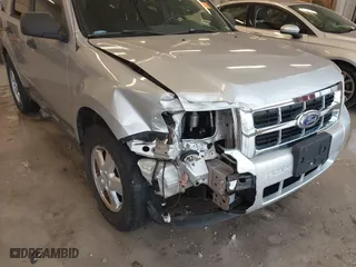 2010 Ford Escape XLT with VIN 1FMCU0D70AKB09942, listed as a IAAI auction lot 41572582 with 218,296 mi miles. Bid and sale history available at carsss.com. Image 6.