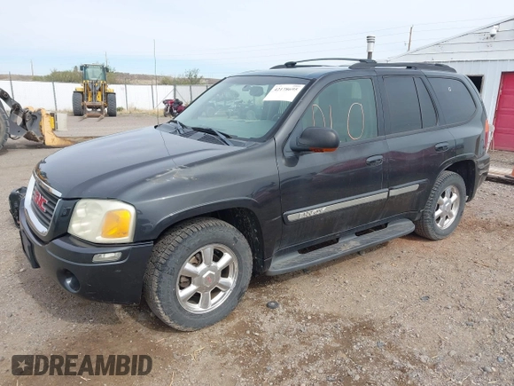 2003 GMC Envoy SLT with VIN 1GKDT13S632197541, listed as a IAAI auction lot 42178695 with 221,189 mi miles and . Bid and sale history available at DreamBid. Image 2.