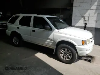 2004 Isuzu Rodeo S with VIN 4S2DM58W544300969, listed as a Copart auction lot 69563444 with 304,129 mi miles and Non Repairable. Bid and sale history available at DreamBid. Image 4.