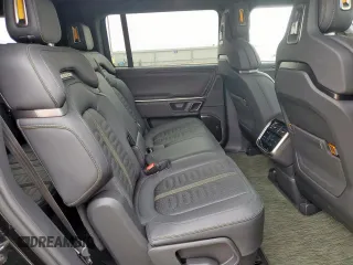 2024 Rivian R1S Adventure z VIN 7PDSGABAXRN035556, wystawiony jako Copart lot #59114065 z przebiegiem 9119 mil mil oraz Szkody całkowita. Historia ofert i sprzedaży dostępna na DreamBid. Obrazek 11.
