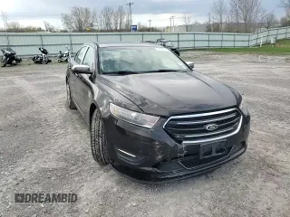 2014 Ford Taurus Limited z VIN 1FAHP2F85EG151167, wystawiony jako Copart lot #54376275 z przebiegiem 136 612 mil mil oraz Szkody całkowita. Historia ofert i sprzedaży dostępna na DreamBid. Obrazek 13.