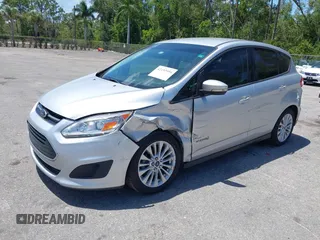 2018 Ford C-Max SE z VIN 1FADP5AU1JL104191, wystawiony jako IAAI lot #42153994 z przebiegiem 132 413 mil mil oraz . Historia ofert i sprzedaży dostępna na DreamBid. Obrazek 6.