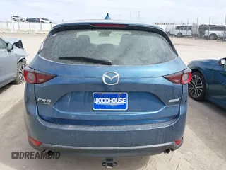 2018 Mazda CX-5 Sport with VIN JM3KFBBM8J0400741, listed as a IAAI auction lot 41860323 with 54,911 mi miles. Bid and sale history available at carsss.com. Image 16.