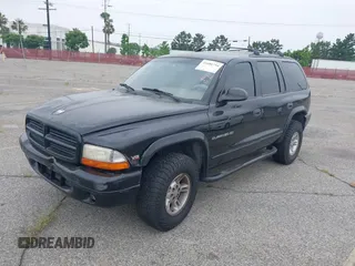 1999 Dodge Durango z VIN 1B4HS28Y2XF601465, wystawiony jako IAAI lot #41686754 z przebiegiem 168 550 mil mil oraz . Historia ofert i sprzedaży dostępna na DreamBid. Obrazek 2.
