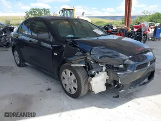 2010 Mitsubishi Lancer DE with VIN JA32U1FU3AU030048, listed as a IAAI auction lot 41953386 with 216,341 mi miles. Bid and sale history available at carsss.com. Image 1.