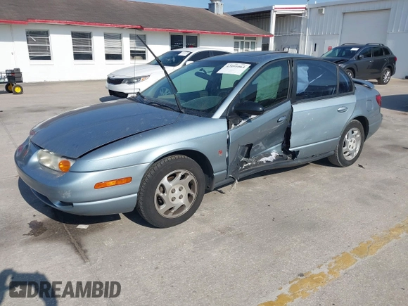 2002 Saturn SL z VIN 1G8ZK54702Z130021, wystawiony jako IAAI lot #42091064 z przebiegiem 68 754 mil mil oraz . Historia ofert i sprzedaży dostępna na DreamBid. Obrazek 2.