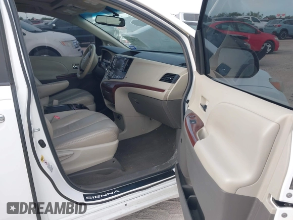 2011 Toyota Sienna XLE AAS with VIN 5TDYK3DC8BS108689, listed as a IAAI auction lot 42308965 with 179,524 mi miles and . Bid and sale history available at DreamBid. Image 5.