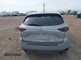2017 Mazda CX-5 Grand Touring with VIN JM3KFBDL8H0227348, listed as a IAAI auction lot 41572377 with 124,908 mi miles. Bid and sale history available at carsss.com. Image 16.