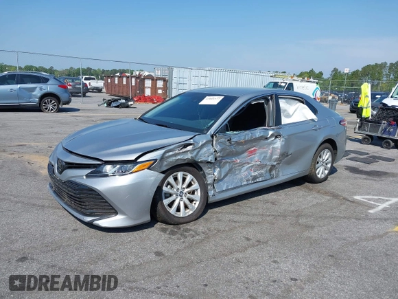2020 Toyota Camry LE with VIN 4T1C11AK9LU341762, listed as a IAAI auction lot 42001577 with 84,991 mi miles and . Bid and sale history available at DreamBid. Image 17.