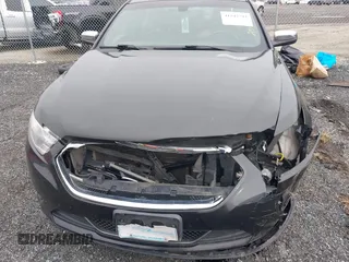 2014 Ford Taurus Limited with VIN 1FAHP2F81EG113984, listed as a IAAI auction lot 41542792 with 213,206 mi miles. Bid and sale history available at carsss.com. Image 13.