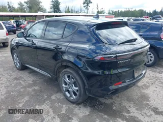 2024 Dodge Hornet R/T z VIN ZACPDFCW9R3A32594, wystawiony jako IAAI lot #42312913 z przebiegiem 22 544 mil mil oraz . Historia ofert i sprzedaży dostępna na DreamBid. Obrazek 3.