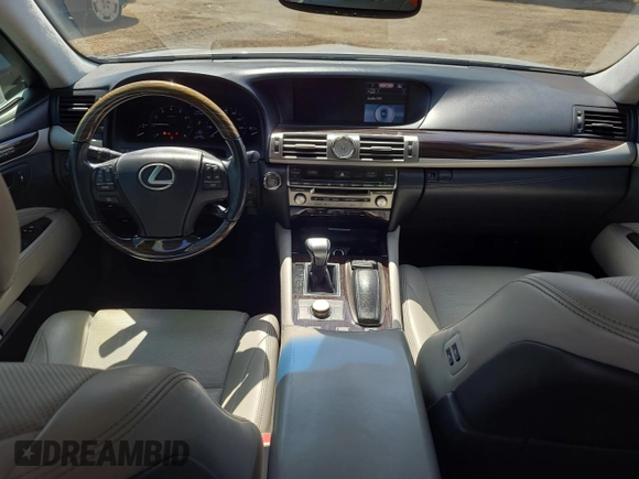 2015 Lexus LS 460 L with VIN JTHGL5EFXF5055498, listed as a Copart auction lot 82579834 with 112,465 mi miles and Salvage title. Bid and sale history available at DreamBid. Image 8.