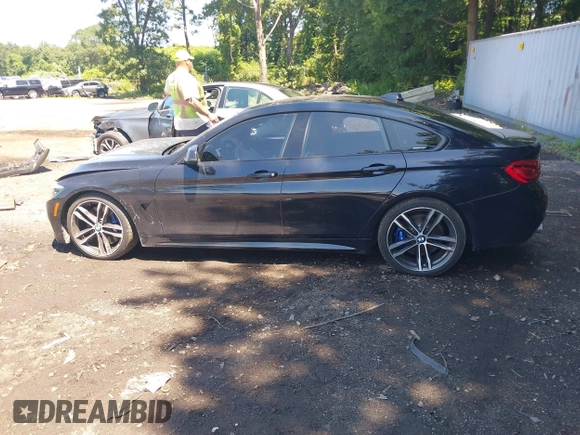 2019 BMW 4 Series 440i xDrive with VIN WBA4J7C57KBM76622, listed as a IAAI auction lot 39738945 with 79,540 mi miles and . Bid and sale history available at carsss.com. Image 14.