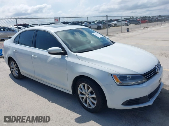 2014 Volkswagen Jetta SE with VIN 3VWD07AJ2EM444256, listed as a IAAI auction lot 42383287 with 99,654 mi miles and . Bid and sale history available at DreamBid. Image 1.