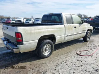 2001 Dodge 1500 z VIN 3B7HC13Y71G242024, wystawiony jako IAAI lot #41408295 z przebiegiem 150 753 mil mil oraz . Historia ofert i sprzedaży dostępna na DreamBid. Obrazek 4.