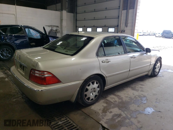 2004 Acura RL w/Navigation System z VIN JH4KA96644C004769, wystawiony jako Copart lot #59800205 z przebiegiem 172 279 mil mil oraz Szkoda całkowita • Salvage title. Historia ofert i sprzedaży dostępna na DreamBid. Obrazek 3.
