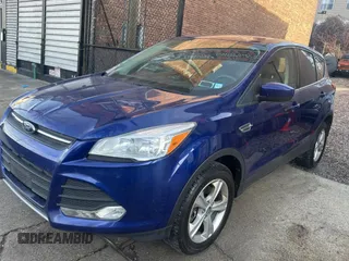 2013 Ford Escape SE with VIN 1FMCU9GX9DUA32769, listed as a Copart auction lot 46907285 with 125,348 mi miles and Clean Title. Bid and sale history available at DreamBid. Image 2.