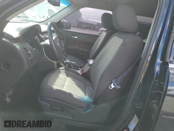 2010 Ford Flex SEL z VIN 2FMGK5CC6ABA24939, wystawiony jako Copart lot #51869795 z przebiegiem 174 987 mil mil oraz Szkoda całkowita • Salvage title. Historia ofert i sprzedaży dostępna na DreamBid. Obrazek 7.