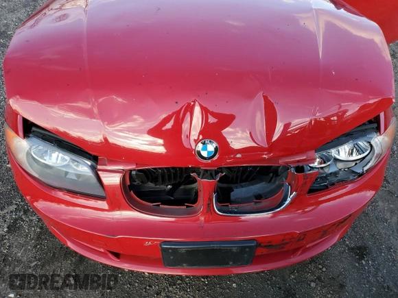 2010 BMW 1 Series 128i with VIN WBAUL7C54AVJ77712, listed as a Copart auction lot 83158294 with Not provided miles and Salvage title. Bid and sale history available at DreamBid. Image 12.
