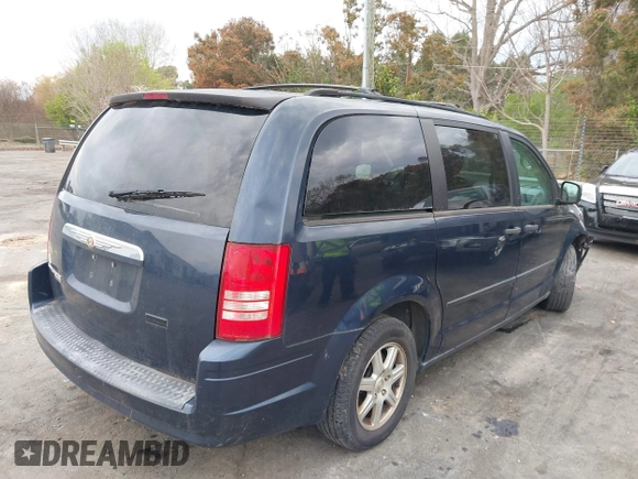 2008 Chrysler Town & Country LX with VIN 2A8HR44H28R114978, listed as a IAAI auction lot 41860775 with 179,828 mi miles. Bid and sale history available at carsss.com. Image 4.