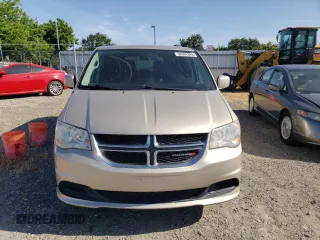 2014 Dodge Grand Caravan SXT z VIN 2C4RDGCG6ER427418, wystawiony jako Copart lot #58804395 z przebiegiem 154 524 mil mil oraz Tytuł czysty. Historia ofert i sprzedaży dostępna na DreamBid. Obrazek 5.