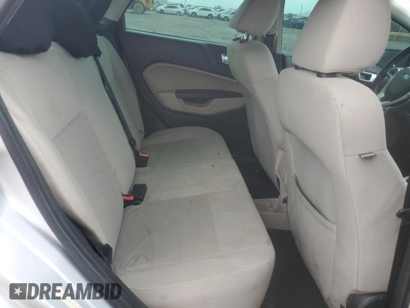 2014 Ford Fiesta SE z VIN 3FADP4BJ8EM133030, wystawiony jako Copart lot #52046065 z przebiegiem 113 792 mil mil oraz Szkoda całkowita • Salvage title. Historia ofert i sprzedaży dostępna na DreamBid. Obrazek 10.