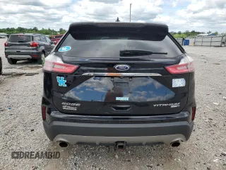 2019 Ford Edge Titanium with VIN 2FMPK4K94KBB35538, listed as a Copart auction lot 57770545 with 85,021 mi miles and Salvage title. Bid and sale history available at DreamBid. Image 6.