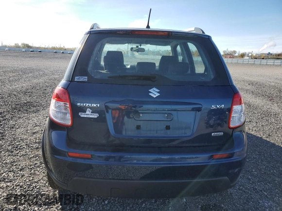 2010 Suzuki SX4 Touring with VIN JS2YB5A71A6310393, listed as a Copart auction lot 77673534 with 65,987 mi miles and Clean Title. Bid and sale history available at carsss.com. Image 6.