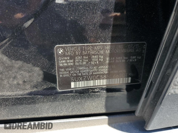 2011 BMW X5 35d with VIN 5UXZW0C58BL662048, listed as a Copart auction lot 55648975 with 166,291 mi miles and Salvage title. Bid and sale history available at DreamBid. Image 13.