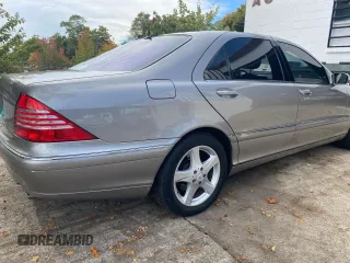 2005 Mercedes-Benz S-Class 5.0L with VIN WDBNG75J35A460118, listed as a Copart auction lot 77103084 with 99,573 mi miles and Clean Title. Bid and sale history available at carsss.com. Image 4.