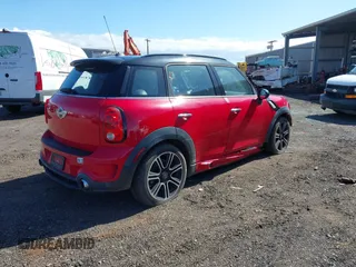 2015 MINI Countryman S with VIN WMWZC3C52FWT05204, listed as a IAAI auction lot 41492775 with 80,785 mi miles and . Bid and sale history available at DreamBid. Image 4.