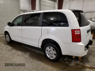2009 Dodge Grand Caravan SE z VIN 2D8HN44E99R542025, wystawiony jako Copart lot #61003595 z przebiegiem 222 476 mil mil oraz Szkoda całkowita • Salvage title. Historia ofert i sprzedaży dostępna na DreamBid. Obrazek 2.