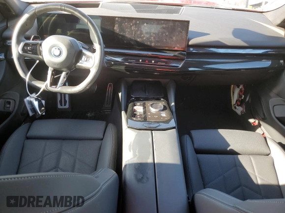 2024 BMW i5 eDrive40 with VIN WBY33FK01RCR76500, listed as a Copart auction lot 65026585 with 3,601 mi miles and Salvage title. Bid and sale history available at DreamBid. Image 8.