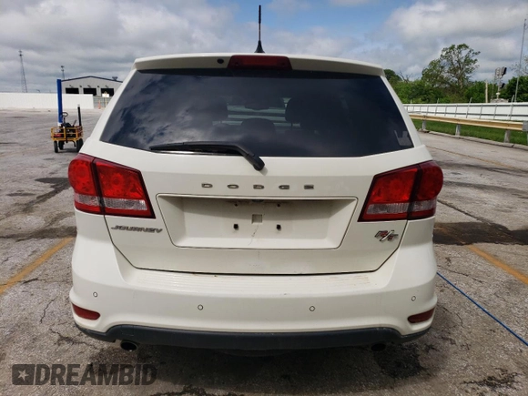 2014 Dodge Journey R/T z VIN 3C4PDCEG4ET308051, wystawiony jako Copart lot #54906995 z przebiegiem 173 960 mil mil oraz Szkoda całkowita • Salvage title. Historia ofert i sprzedaży dostępna na DreamBid. Obrazek 6.
