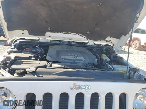 2013 Jeep Wrangler Rubicon with VIN 1C4BJWCG3DL590006, listed as a Copart auction lot 85855594 with 99,218 mi miles and Salvage title. Bid and sale history available at DreamBid. Image 12.
