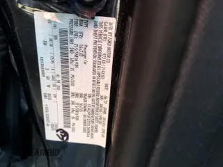 2013 Ford Focus SE z VIN 1FADP3F27DL369634, wystawiony jako Copart lot #61409725 z przebiegiem 122 709 mil mil oraz Szkoda całkowita • Salvage title. Historia ofert i sprzedaży dostępna na DreamBid. Obrazek 13.