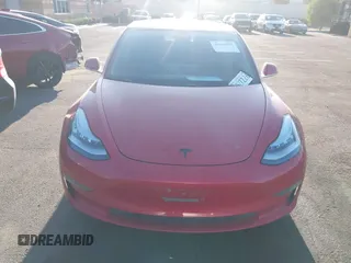 2018 Tesla Model 3 Long Range Battery with VIN 5YJ3E1EA3JF035785, listed as a IAAI auction lot 41986774 with 33,965 mi miles and . Bid and sale history available at DreamBid. Image 12.