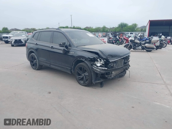 2023 Volkswagen Tiguan SE R-Line Black with VIN 3VVCB7AX1PM106543, listed as a IAAI auction lot 41784559 with 39,846 mi miles and . Bid and sale history available at DreamBid. Image 1.
