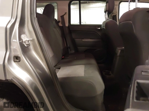 2012 Jeep Patriot Sport with VIN 1C4NJRBB1CD562668, listed as a IAAI auction lot 42463536 with 236,301 mi miles and . Bid and sale history available at DreamBid. Image 8.