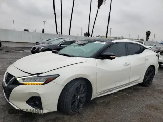 2020 Nissan Maxima SR with VIN 1N4AA6EV0LC382709, listed as a Copart auction lot 47679895 with 82,863 mi miles and Salvage Title. Bid and sale history available at DreamBid. Image 1.
