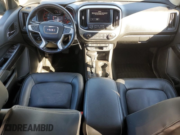 2016 GMC Canyon 4WD SLT with VIN 1GTP6DE11G1357147, listed as a Copart auction lot 77835344 with 106,890 mi miles and Salvage Title. Bid and sale history available at carsss.com. Image 8.