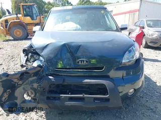 2010 Kia Soul + with VIN KNDJT2A23A7069815, listed as a IAAI auction lot 40173837 with 116,028 mi miles. Bid and sale history available at carsss.com. Image 6.