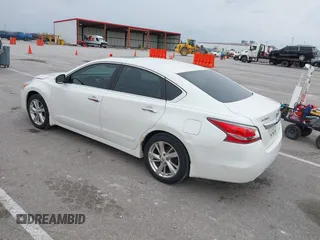2014 Nissan Altima SL with VIN 1N4AL3AP0EC137458, listed as a IAAI auction lot 41953124 with 163,583 mi miles and . Bid and sale history available at DreamBid. Image 3.