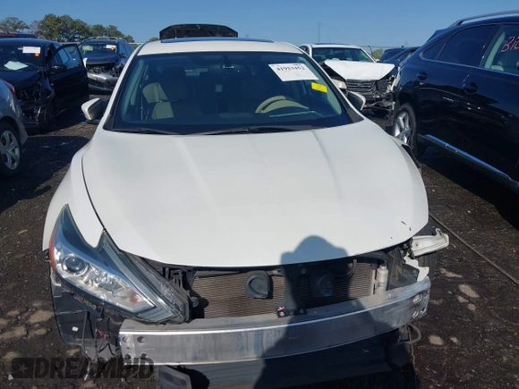 2016 Nissan Altima S z VIN 1N4AL3APXGC202447, wystawiony jako IAAI lot #41923452 z przebiegiem 167 800 mil mil oraz . Historia ofert i sprzedaży dostępna na DreamBid. Obrazek 13.