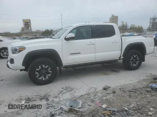 2023 Toyota Tacoma SR z VIN 3TYCZ5AN8PT167874, wystawiony jako Copart lot #71961014 z przebiegiem 87 889 mil mil oraz Czysty tytuł • Clean title. Historia ofert i sprzedaży dostępna na DreamBid. Obrazek 1.